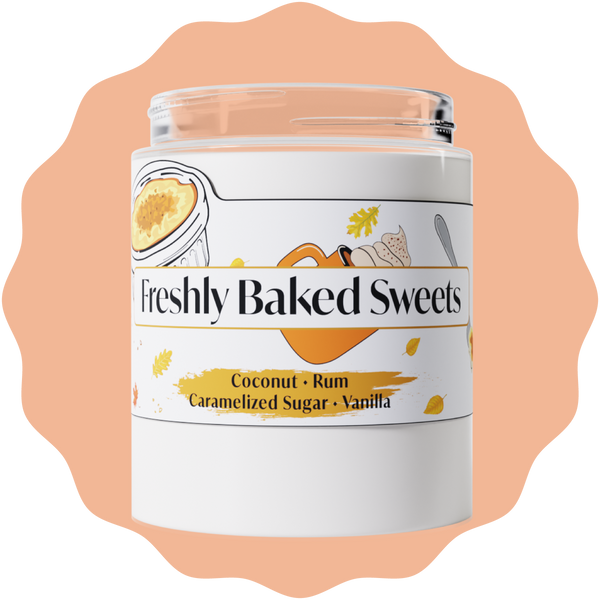 Jar of Freshly Baked Sweets candle with a peach-colored background