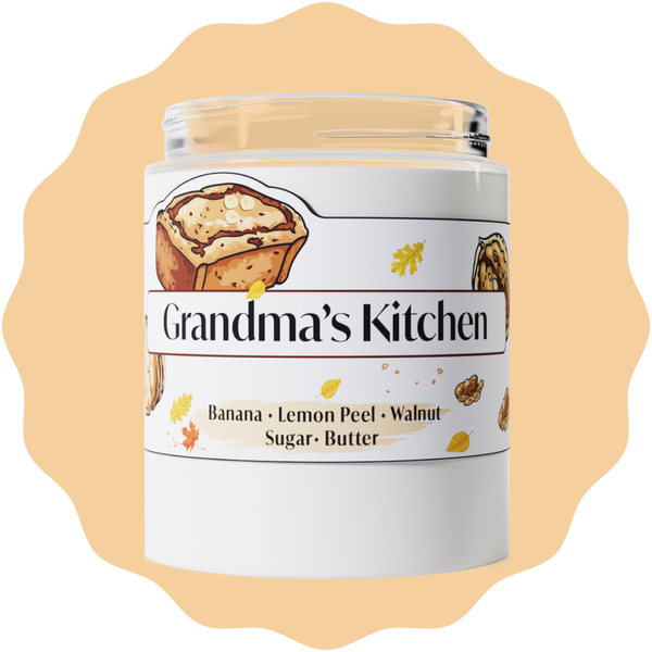 Jar of Granma's Kitchen candle on a light orange background