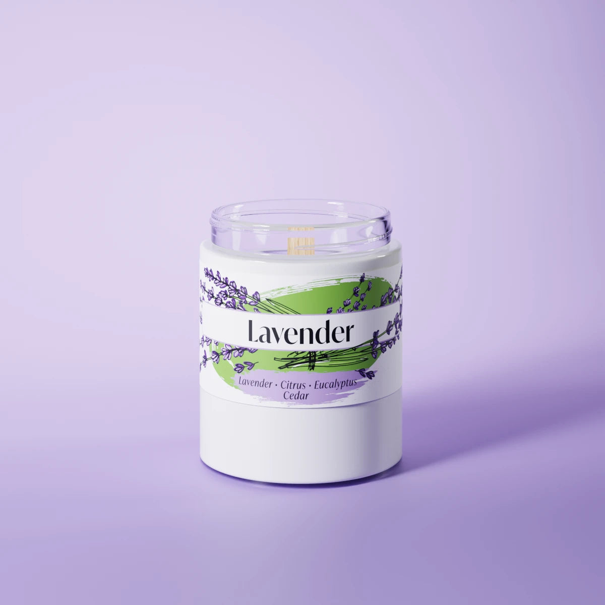 Lavender scented candle in a glass vessel on a purple studio background